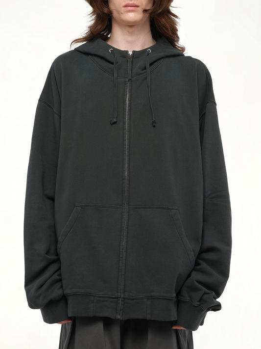 Image of a model wearing Outerwear. Product name - Number Zip Logo Hoodie in Black colour by brand - MAISON MARGIELA