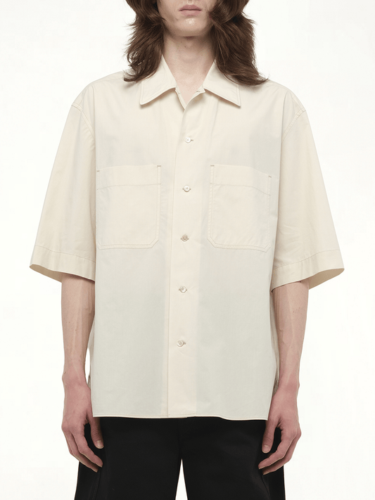 Image of a model wearing Tops. Productname: LEMAIRE Convertible Shirt Warm Beige in Beige colour by brand - LEMAIRE