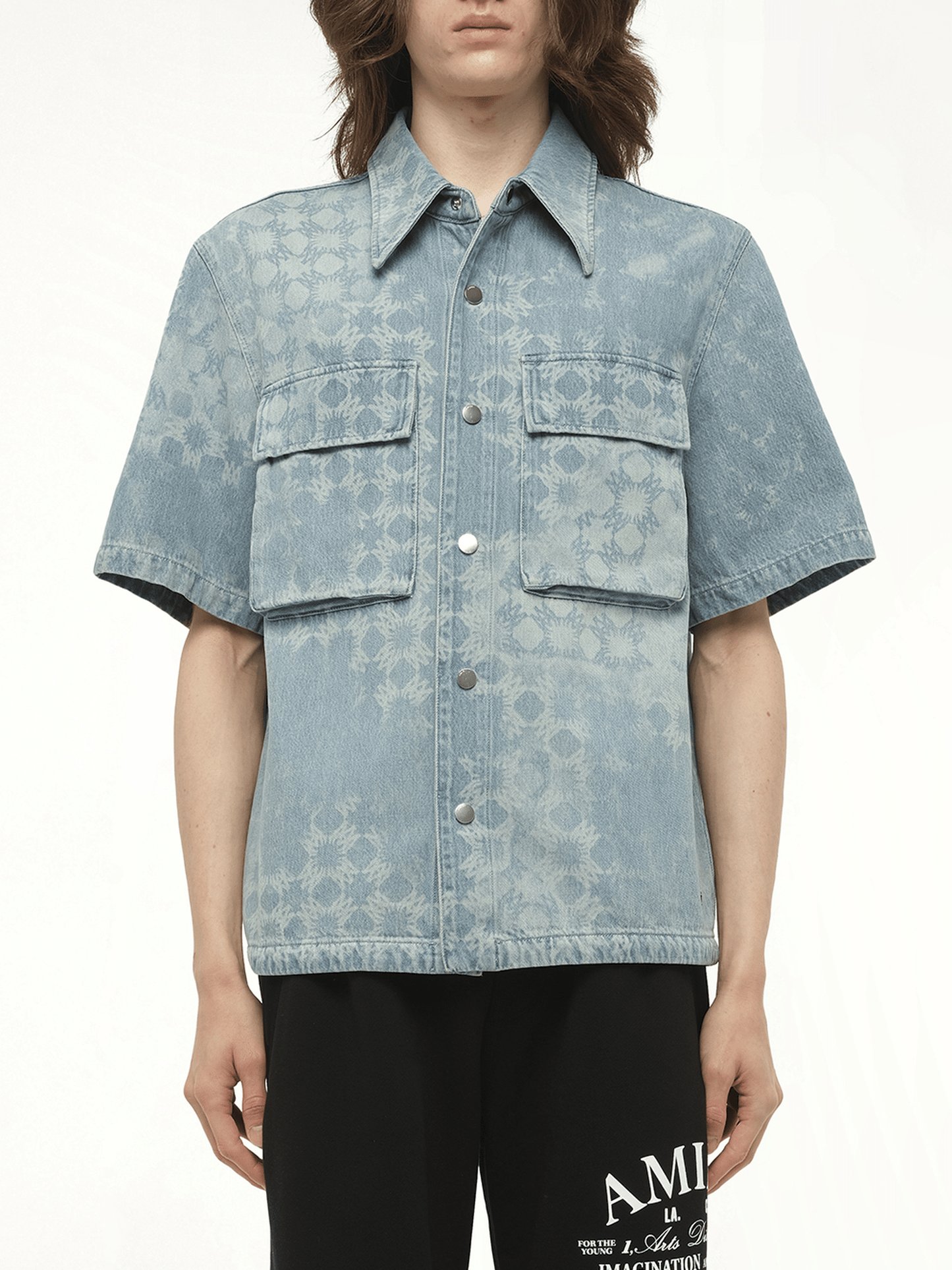 Image of a model wearing Tops. Productname: AMIRI MA Quad Denim Shirt in BLUE colour by brand - AMIRI