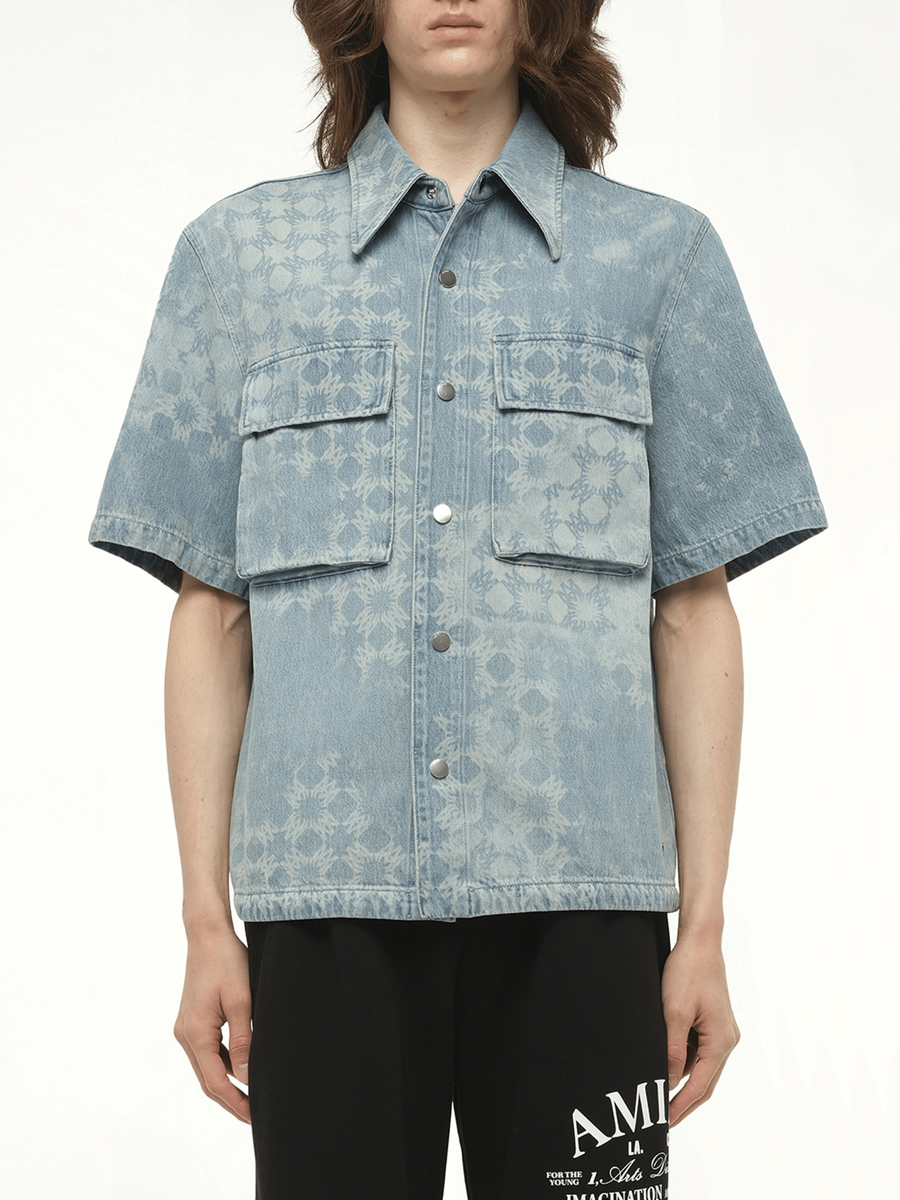 Image of a model wearing Tops. Productname: AMIRI MA Quad Denim Shirt in BLUE colour by brand - AMIRI