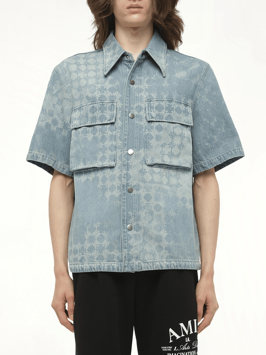 Image of a model wearing Tops. Productname: AMIRI MA Quad Denim Shirt in BLUE colour by brand - AMIRI