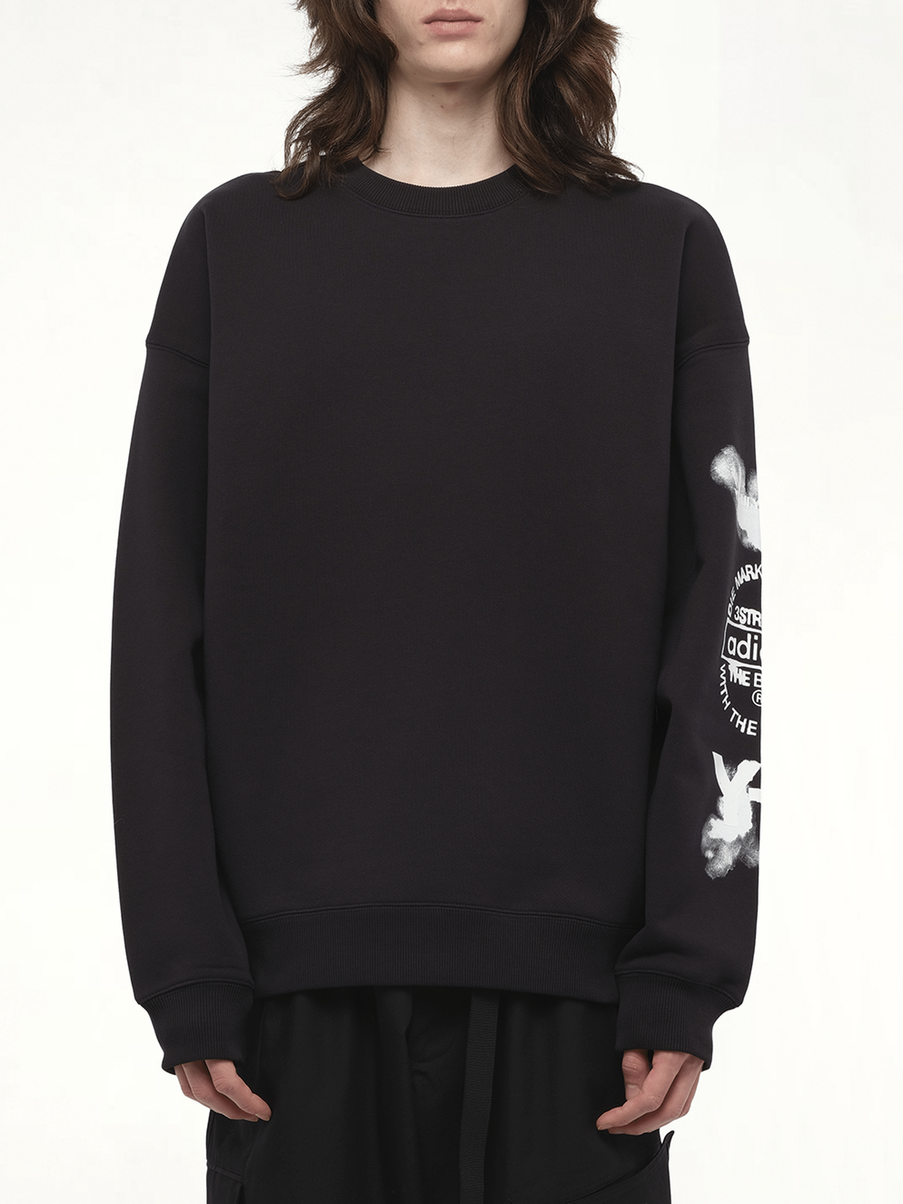 Image of a model wearing Outerwear. Productname: Y-3 Graphic Crew Sweat in Black colour by brand - Y-3