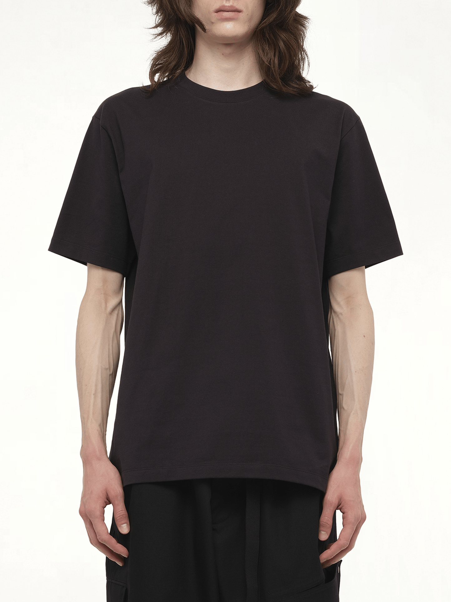 Image of a model wearing Shorts. Productname: Y-3 Graphic Short Sleeve T-Shirt in Black colour by brand - Y-3