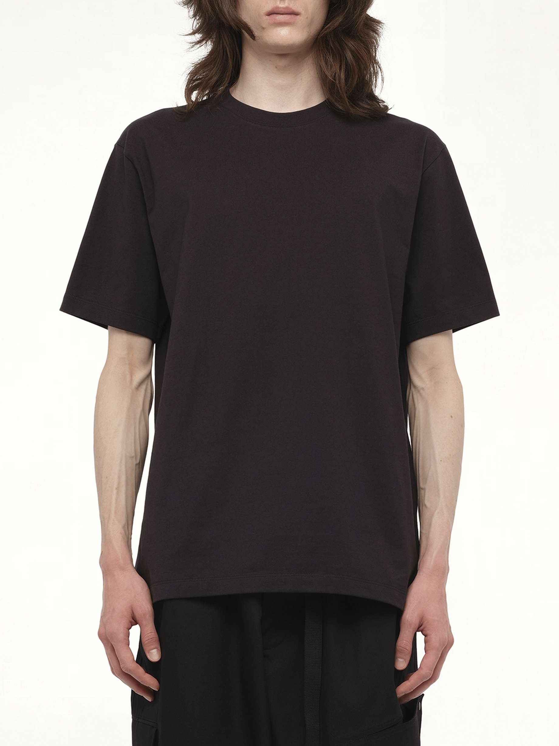 Image of a model wearing Shorts. Productname: Y-3 Graphic Short Sleeve T-Shirt in Black colour by brand - Y-3