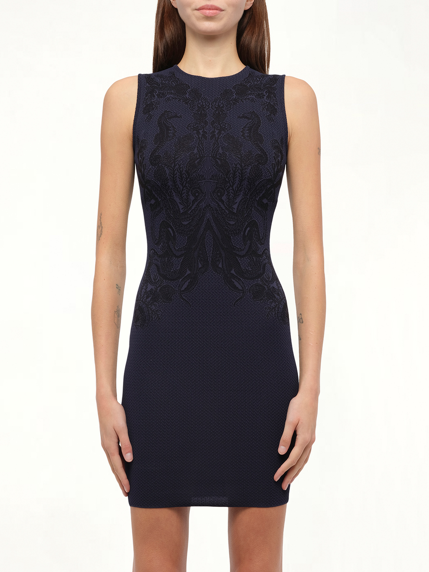 Image of a model wearing Dress. Productname: ALEXANDER MCQUEEN Nk Pencil Mini Dress in Blue colour by brand - ALEXANDER MCQUEEN