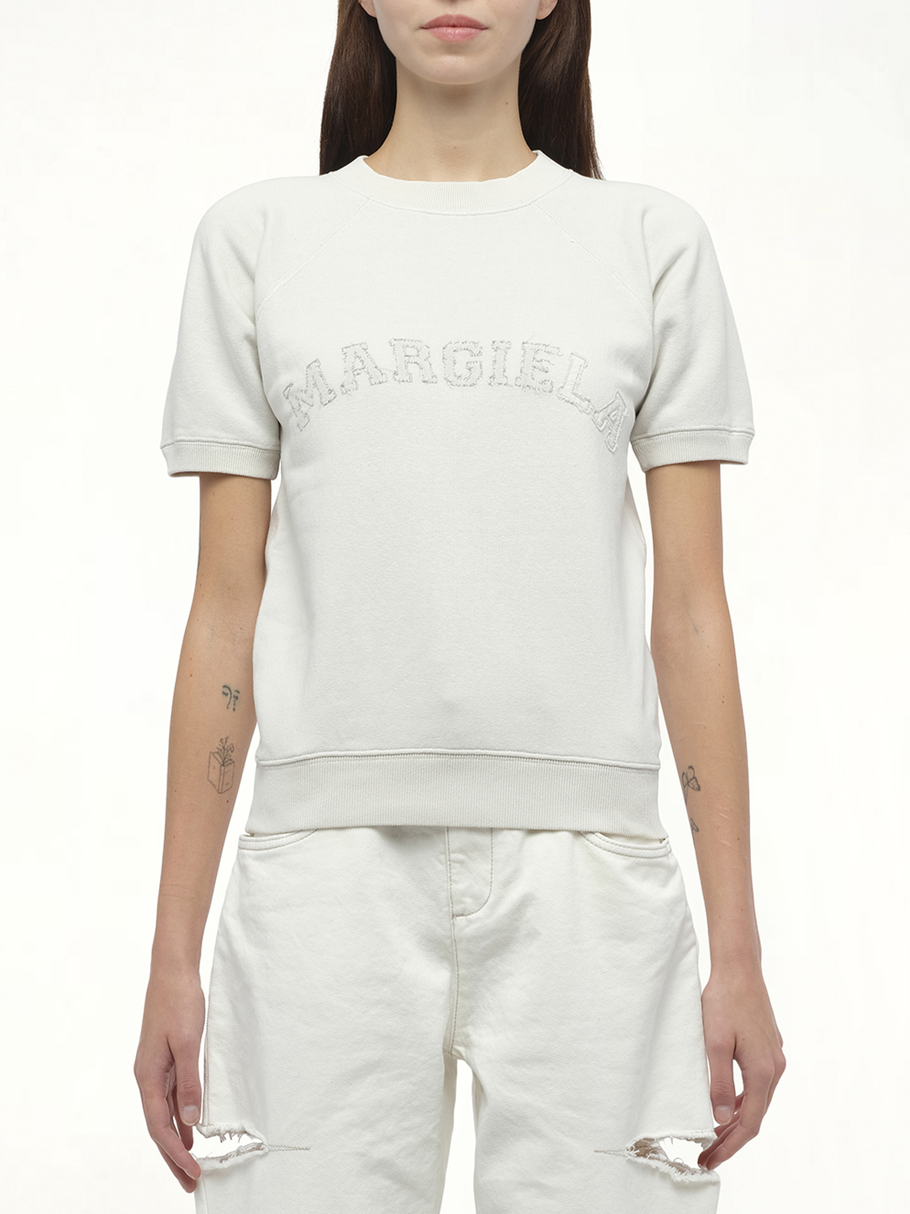 Image of a model wearing Outerwear. Productname: MAISON MARGIELA Margiela Short Sleeve Sweatshirt in YELLOW colour by brand - MAISON MARGIELA