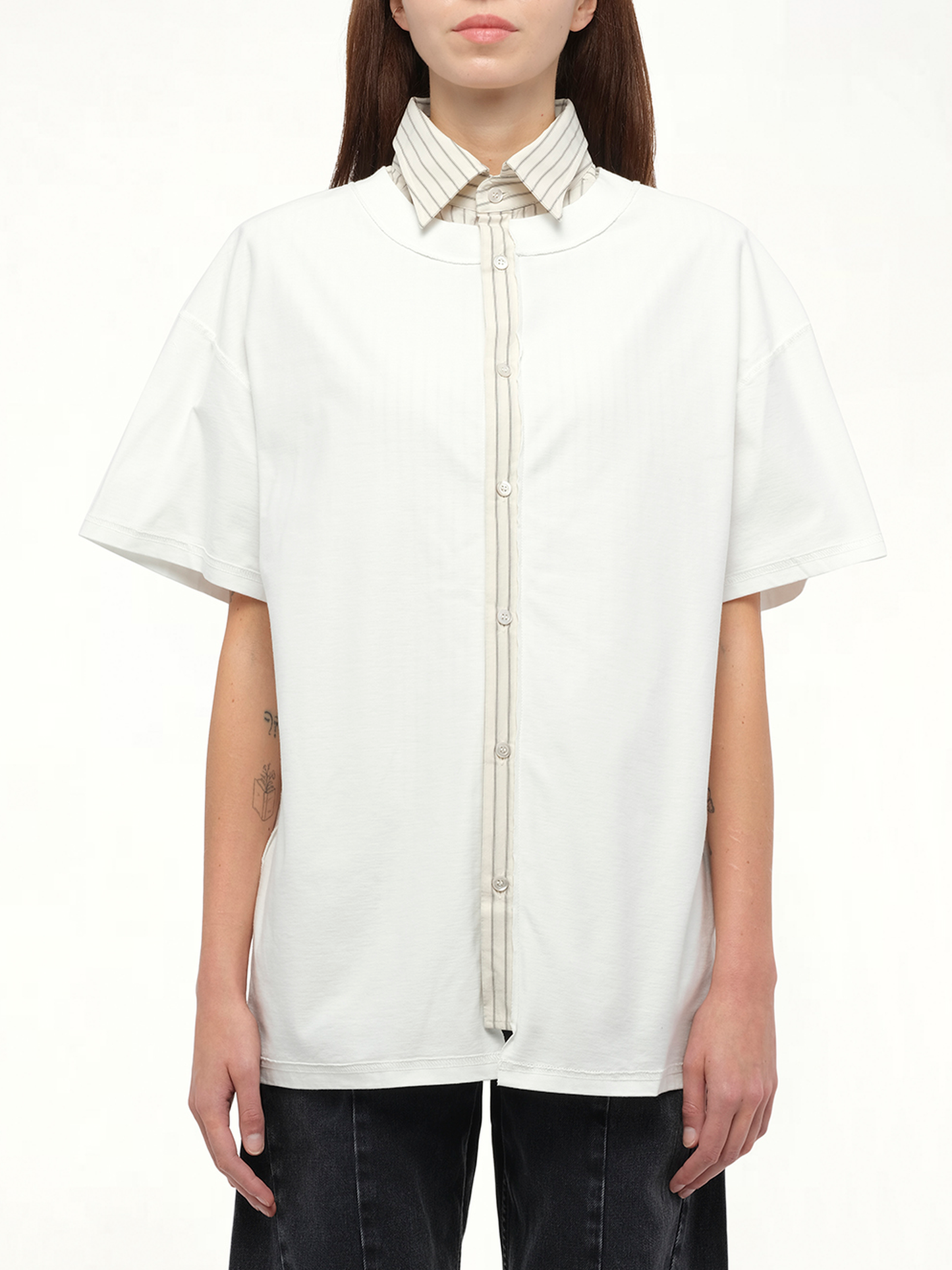 Image of a model wearing Tops. Productname: MAISON MARGIELA Short-sleeved Top in WHITE colour by brand - MAISON MARGIELA