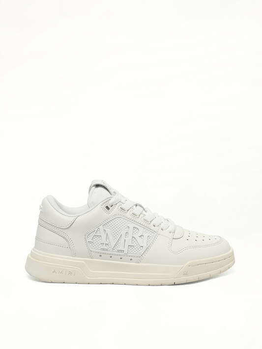 Image of Sneakers. Product name - Classic Low Sneaker in White colour by brand - AMIRI