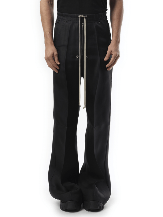Image of a model wearing Pants. Productname: RICK OWENS Silk Wide Bela Pants in BLACK colour by brand - RICK OWENS