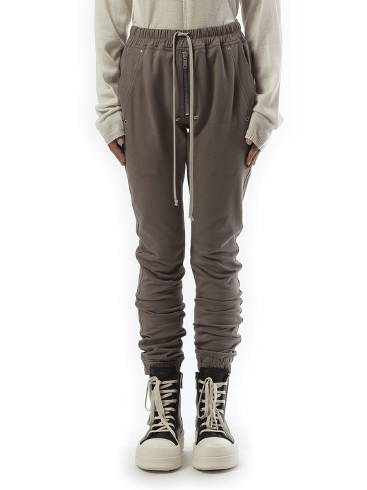 Image of a model wearing Pants. Productname: RICK OWENS Bela Joggers in Dust colour by brand - RICK OWENS