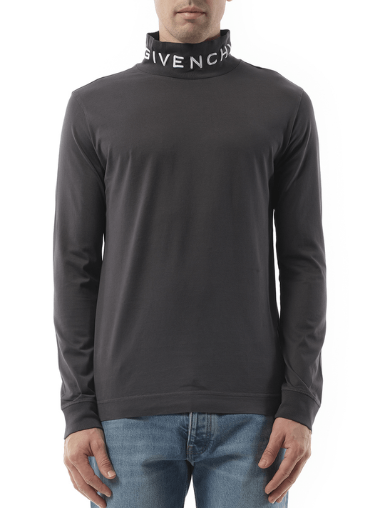 Image of a model wearing Tops. Productname: GIVENCHY Faded Logo Dyed Long Sleeve T-Shirt in BLACK colour by brand - GIVENCHY