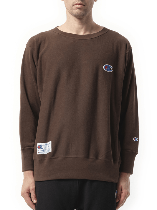 Image of a model wearing Outerwear. Productname: Undercover x Champion Sweatshirt in Brown colour by brand - UNDERCOVER