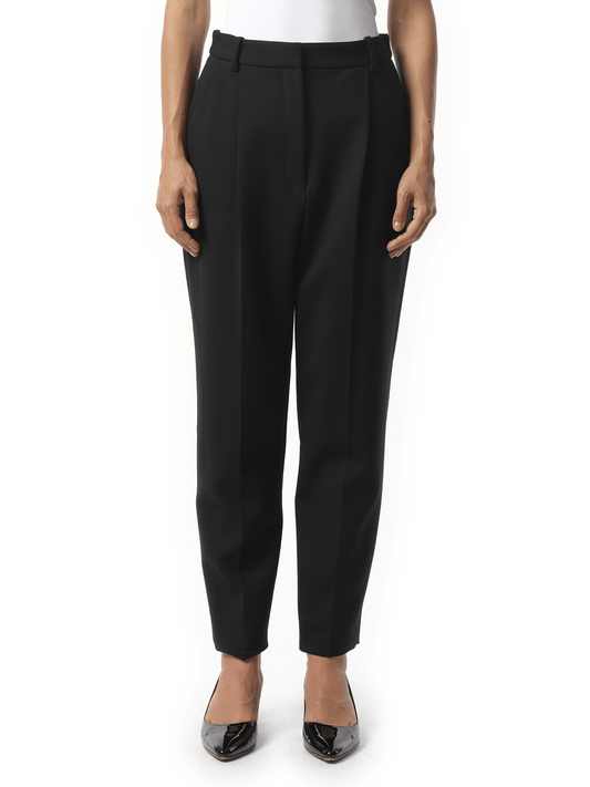 Image of a model wearing Pants. Productname: ALEXANDER MCQUEEN Pants in Black colour by brand - ALEXANDER MCQUEEN