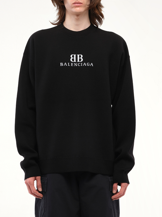 Image of a model wearing Outerwear. Productname: BALENCIAGA Crewneck Sweater in Black colour by brand - BALENCIAGA