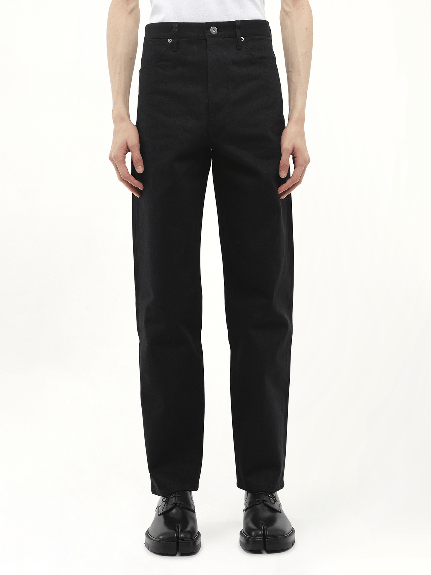 Image of a model wearing Denim. Productname: JIL SANDER Selvedge Japanse Denim Jeans 03 in BLACK colour by brand - JIL SANDER