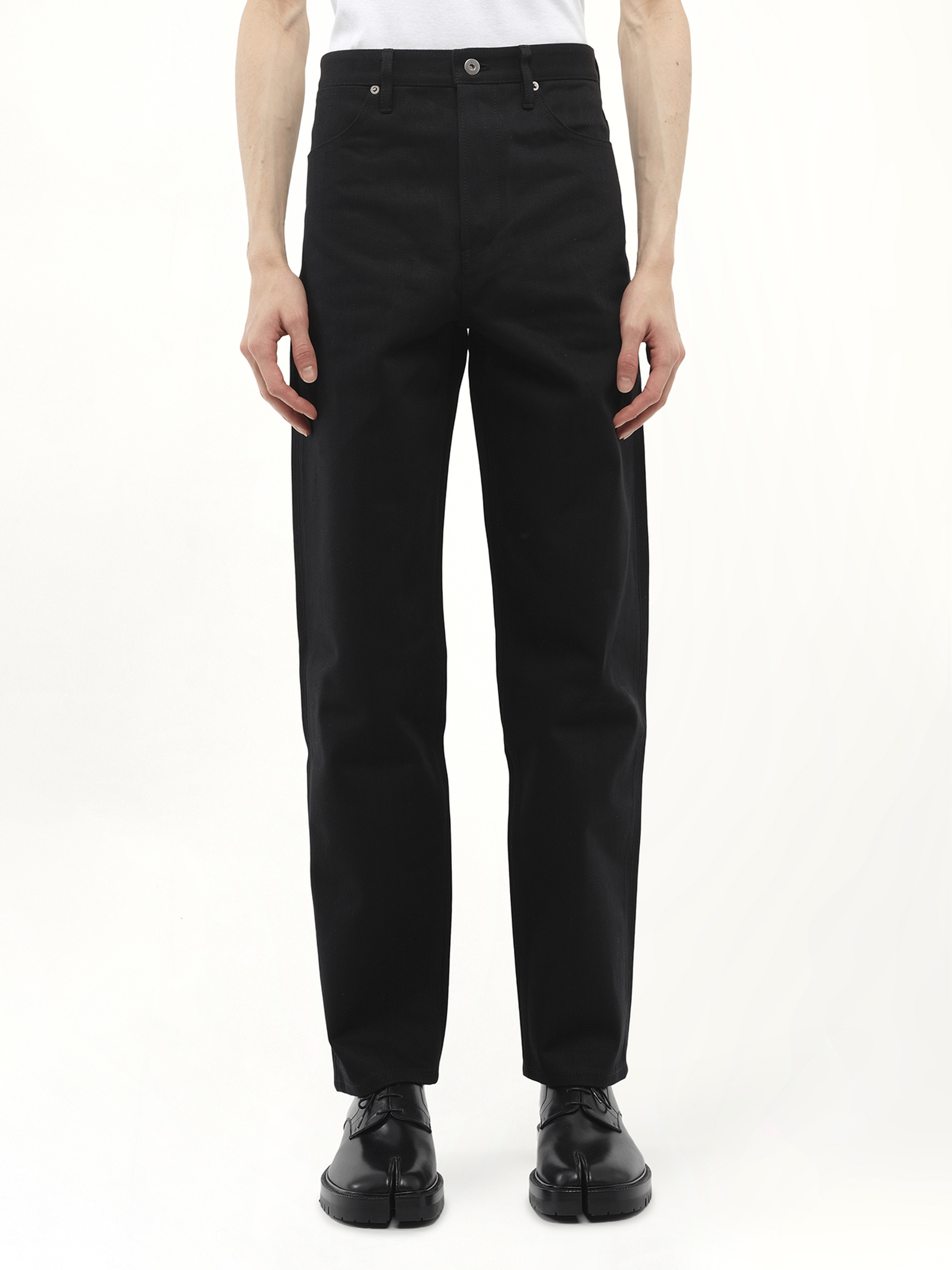 Image of a model wearing Denim. Productname: JIL SANDER Selvedge Japanse Denim Jeans 03 in BLACK colour by brand - JIL SANDER