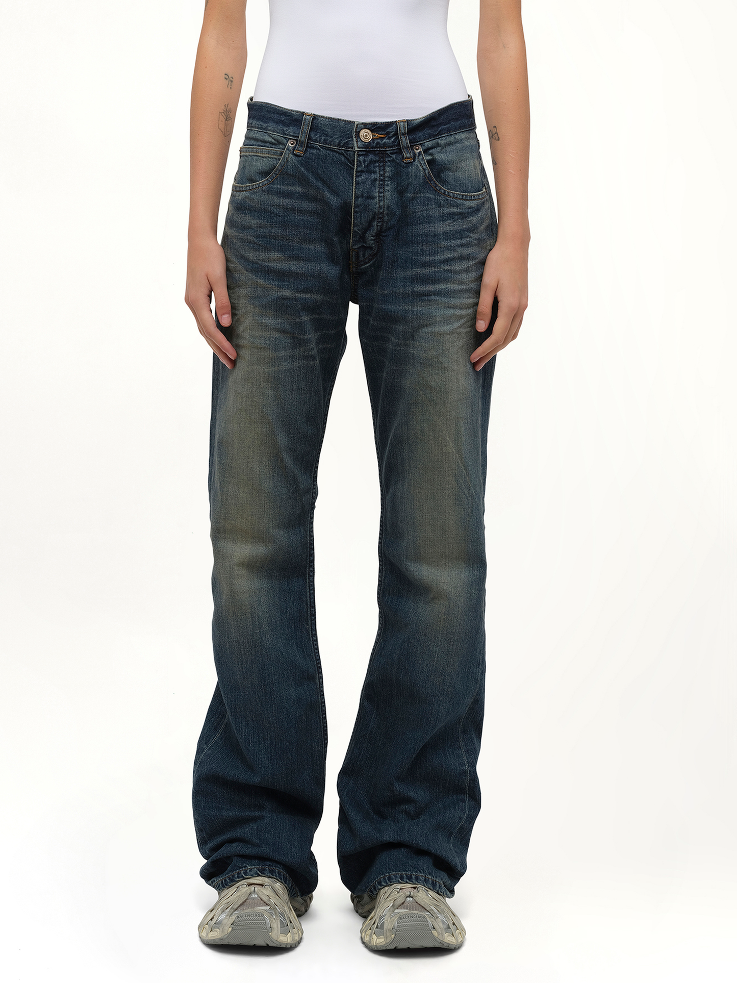 Image of a model wearing Denim. Productname: BALENCIAGA Straight Fit Denim Pants in Blue colour by brand - BALENCIAGA