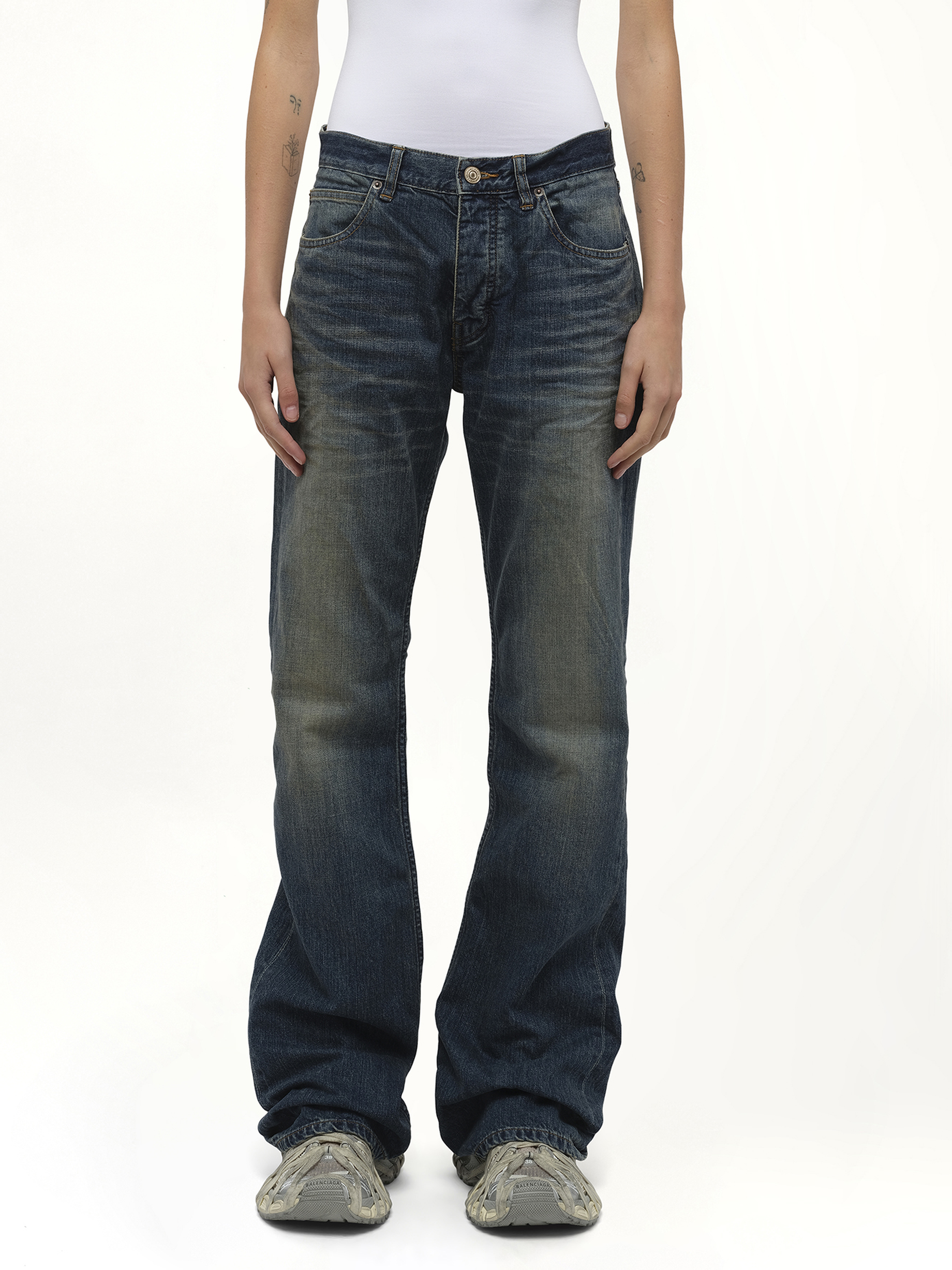 Image of a model wearing Denim. Productname: BALENCIAGA Straight Fit Denim Pants in Blue colour by brand - BALENCIAGA