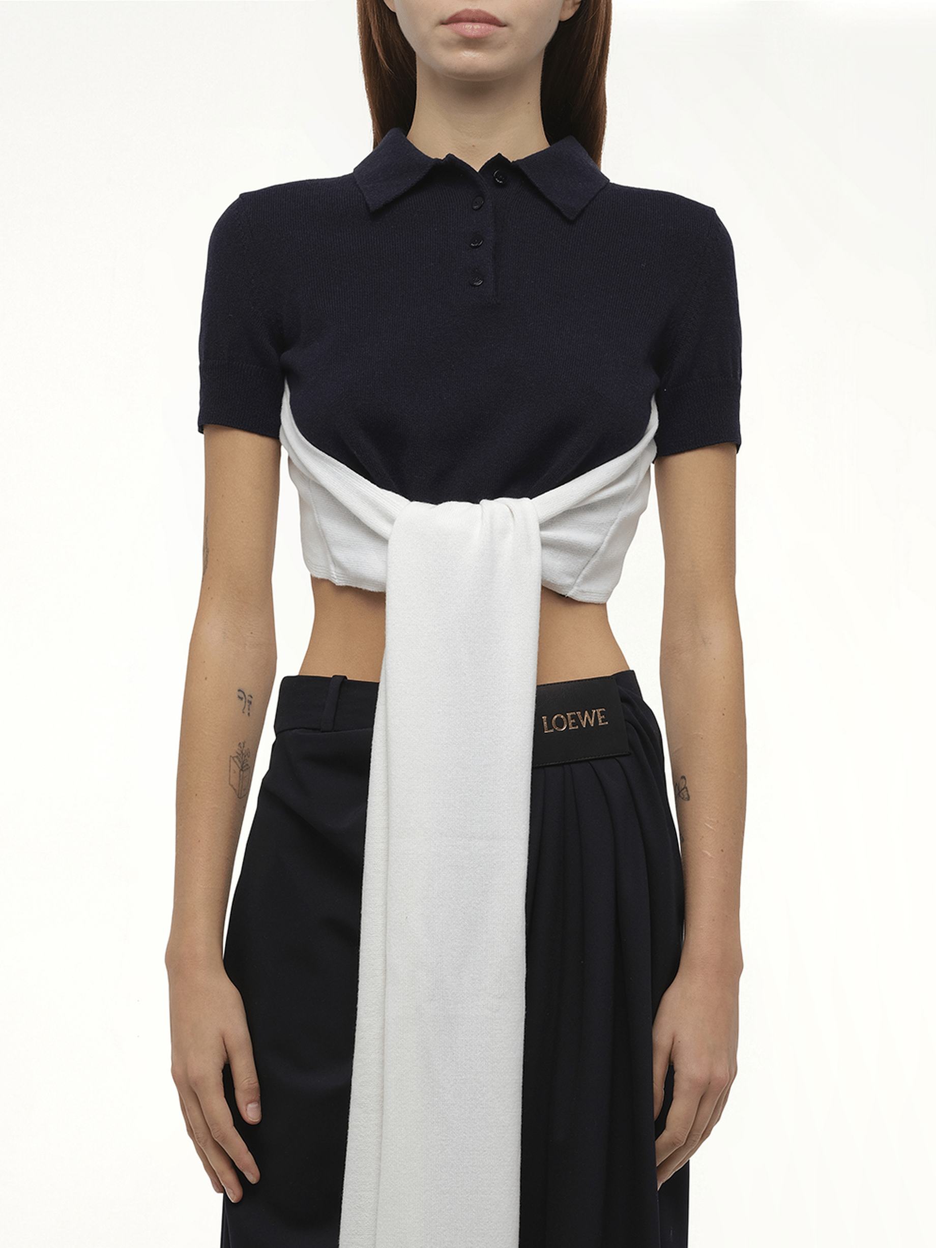 Image of a model wearing Outerwear. Productname: LOEWE Polo Sweater in Navy colour by brand - LOEWE