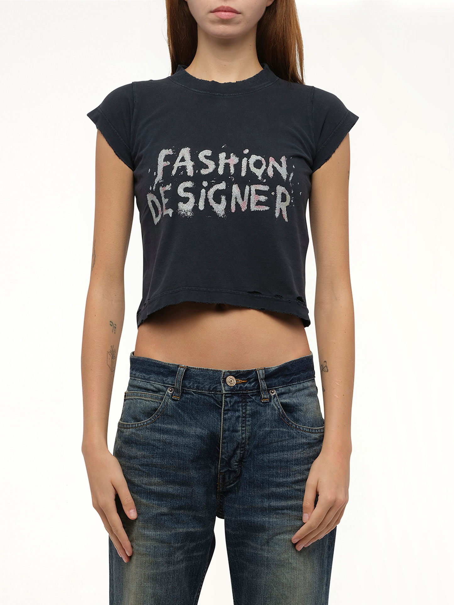 Image of a model wearing Tops. Productname: BALENCIAGA Shrunk T-Shirt in Black colour by brand - BALENCIAGA