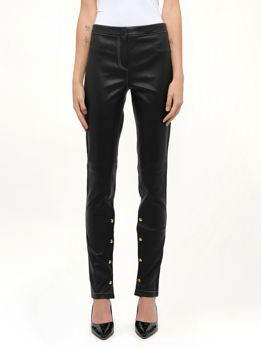 Image of a model wearing Pants. Product name - Loewe Leggings in Black colour by brand - LOEWE