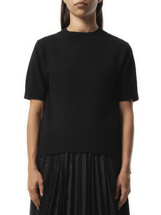 Image of a model wearing Shorts. Productname: SACAI Nylon Twill x Knit Short-sleeve Pullover in Black colour by brand - SACAI