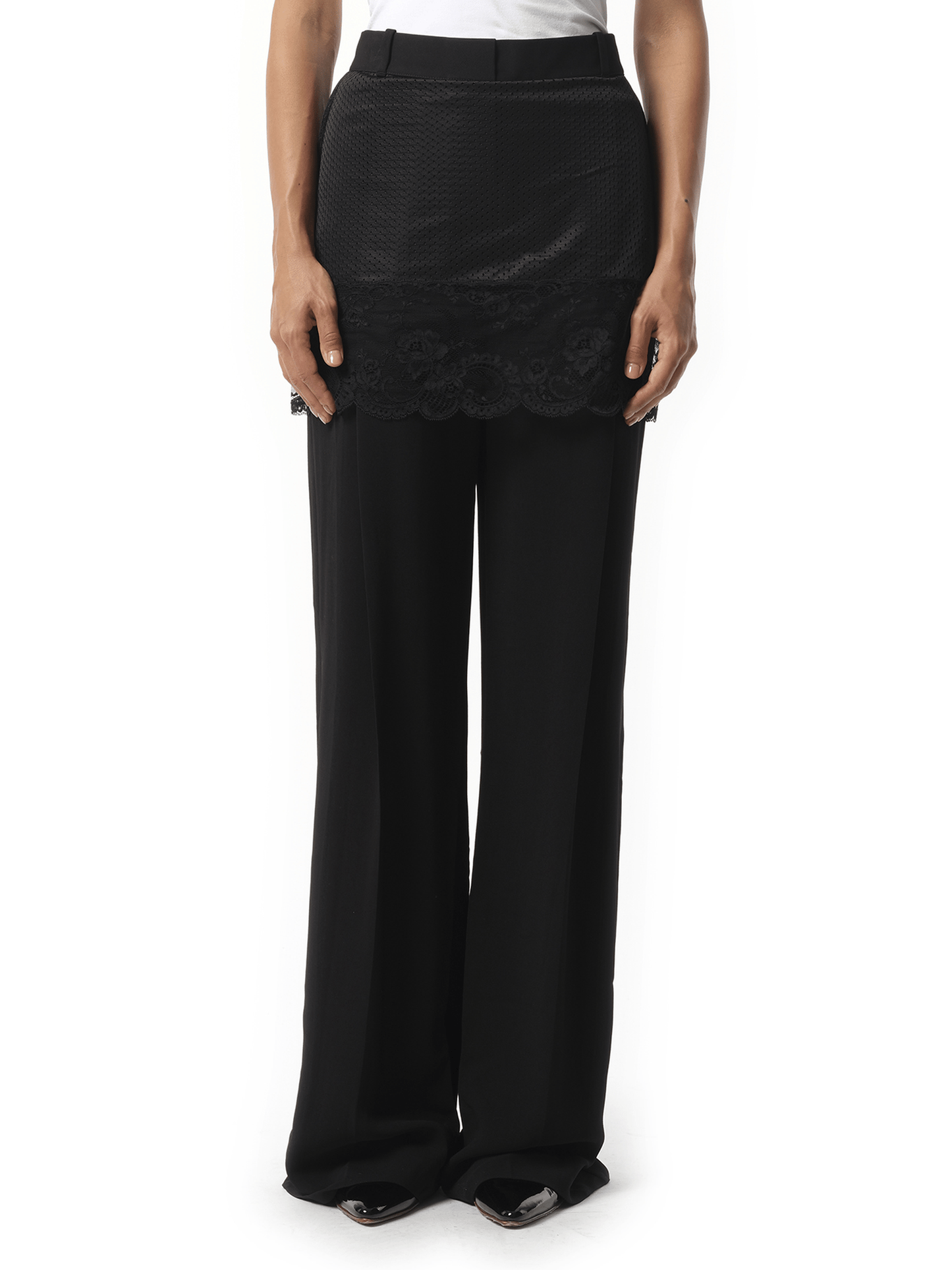 Image of a model wearing Pants. Productname: GIVENCHY Givenchy Trousers in Black colour by brand - GIVENCHY