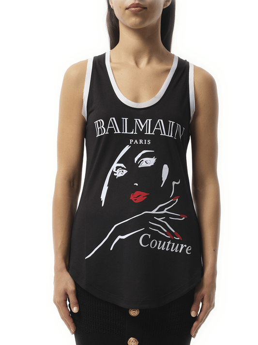Image of a model wearing Tops. Productname: BALMAIN Balmain Beauty Print Jersey & Muslin Top in Black colour by brand - BALMAIN