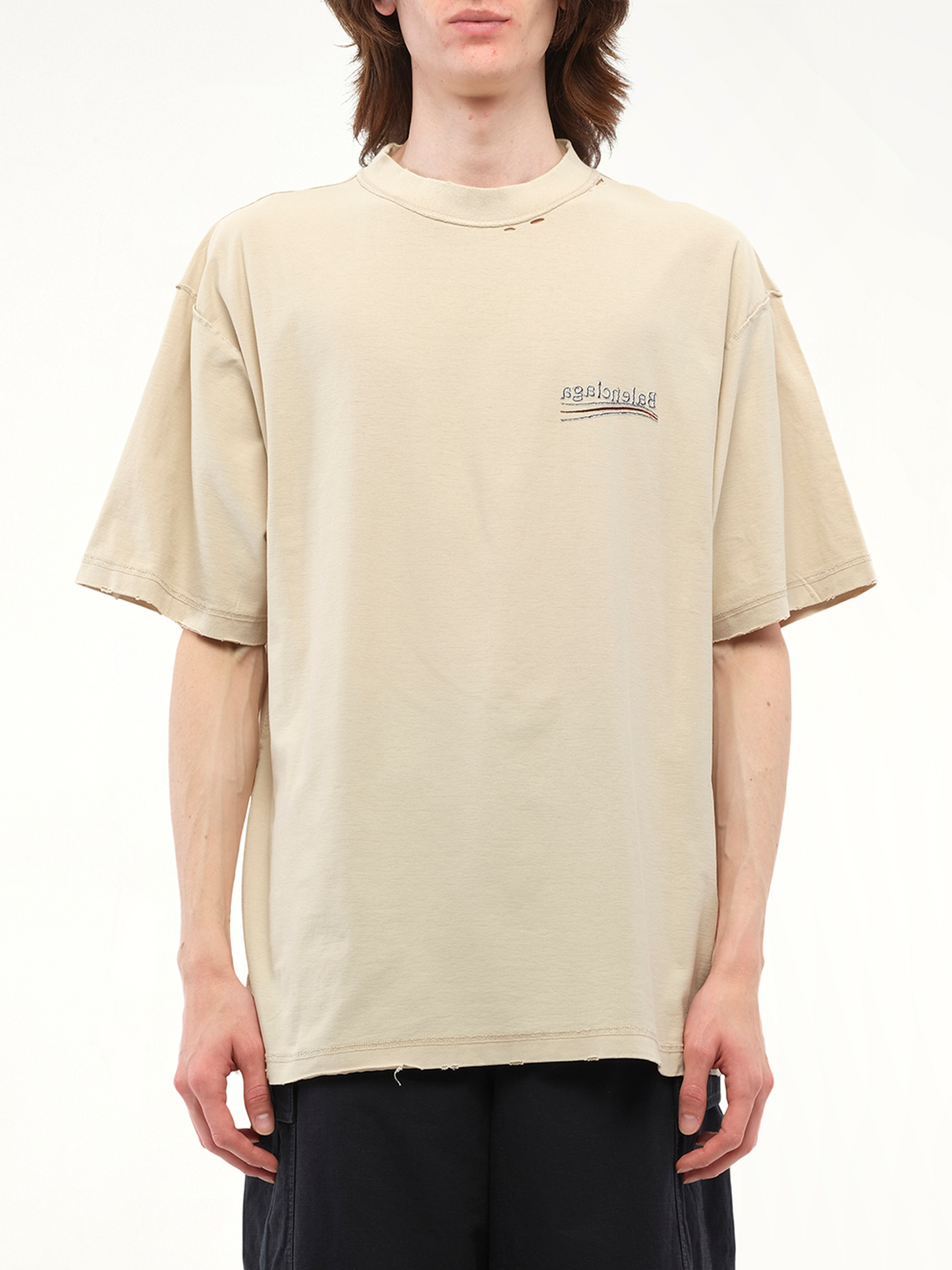 Image of a model wearing Tops. Productname: BALENCIAGA Political Inside-Out Large T-Shirt in Beige colour by brand - BALENCIAGA