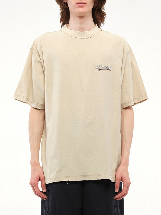 Image of a model wearing Tops. Productname: BALENCIAGA Political Inside-Out Large T-Shirt in Beige colour by brand - BALENCIAGA