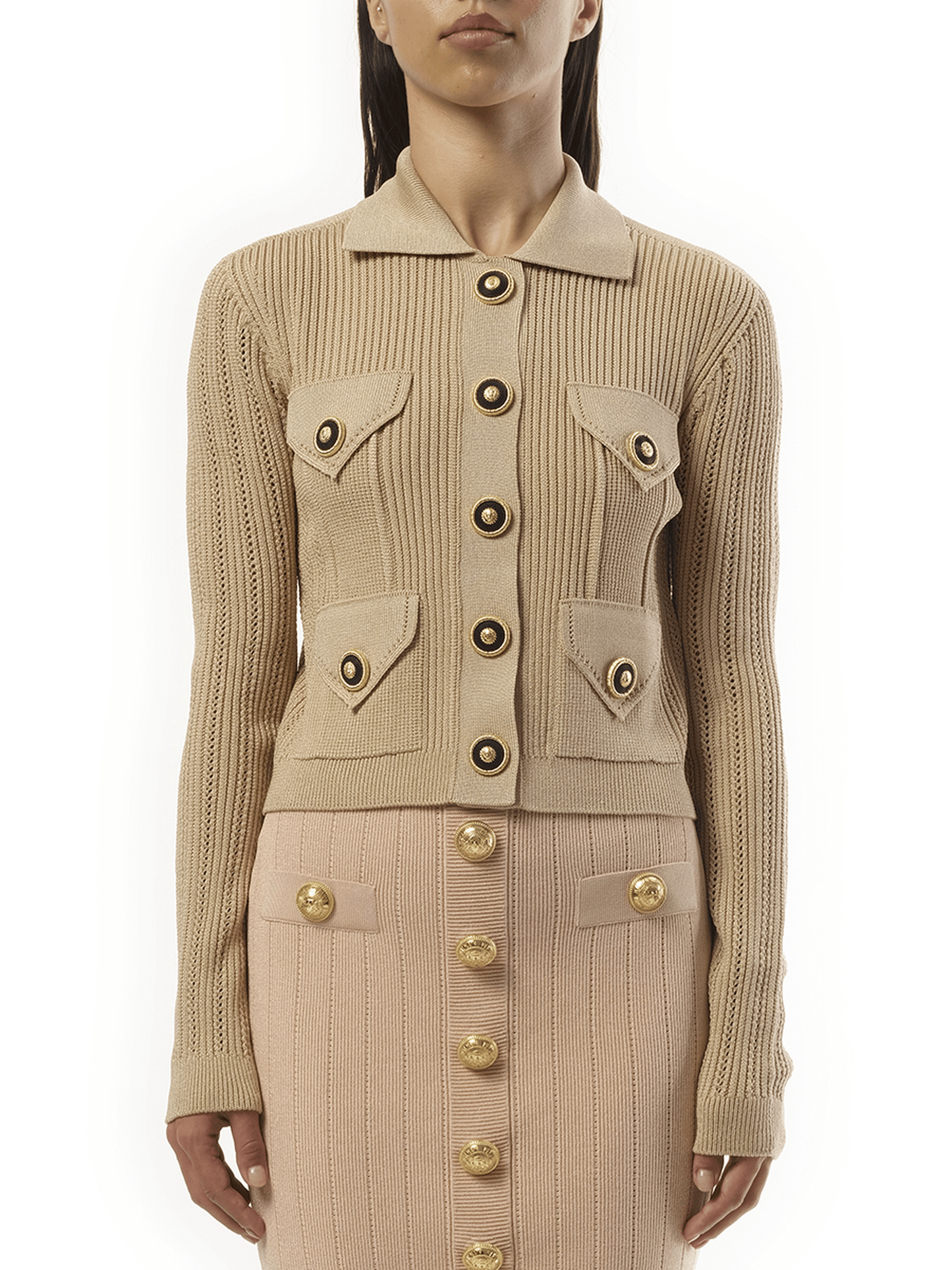 Image of a model wearing Outerwear. Productname: BALMAIN 4 Pockets Buttoned Ribbed Knit Cardigan in Nude Rose colour by brand - BALMAIN