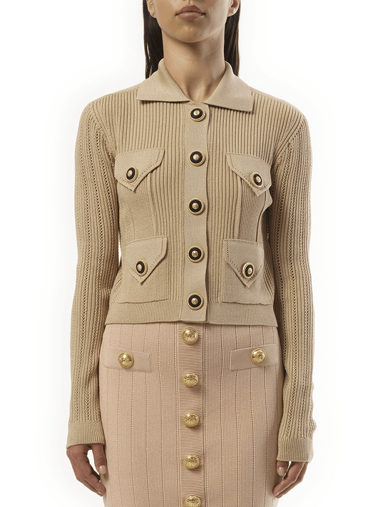 Image of a model wearing Outerwear. Productname: BALMAIN 4 Pockets Buttoned Ribbed Knit Cardigan in Nude Rose colour by brand - BALMAIN