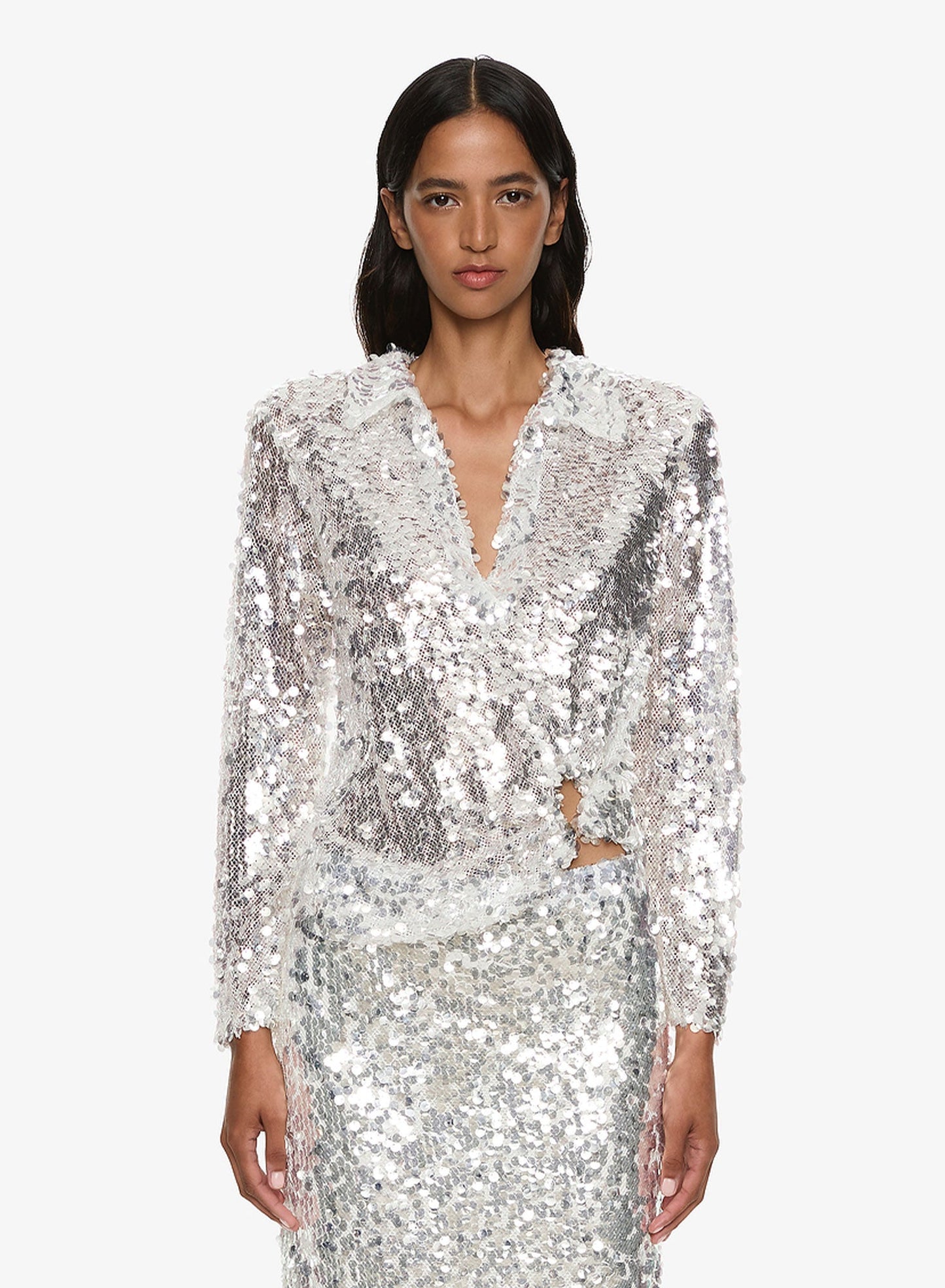 Image of a model wearing Tops. Productname: CHRISTOPHER ESBER Opaline Sequin Long Sleeve Polo in Silver colour by brand - CHRISTOPHER ESBER