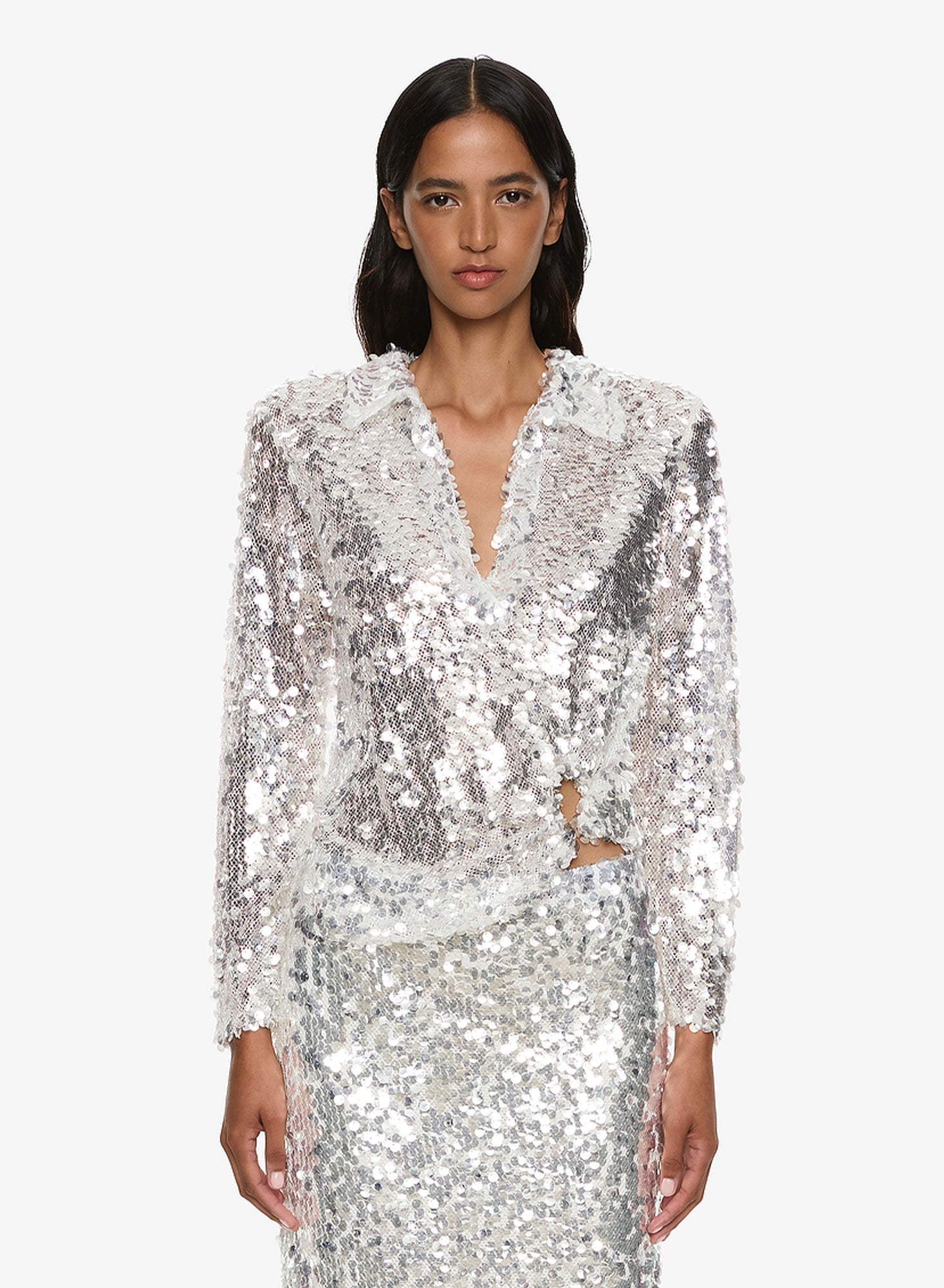 Image of a model wearing Tops. Productname: CHRISTOPHER ESBER Opaline Sequin Long Sleeve Polo in Silver colour by brand - CHRISTOPHER ESBER