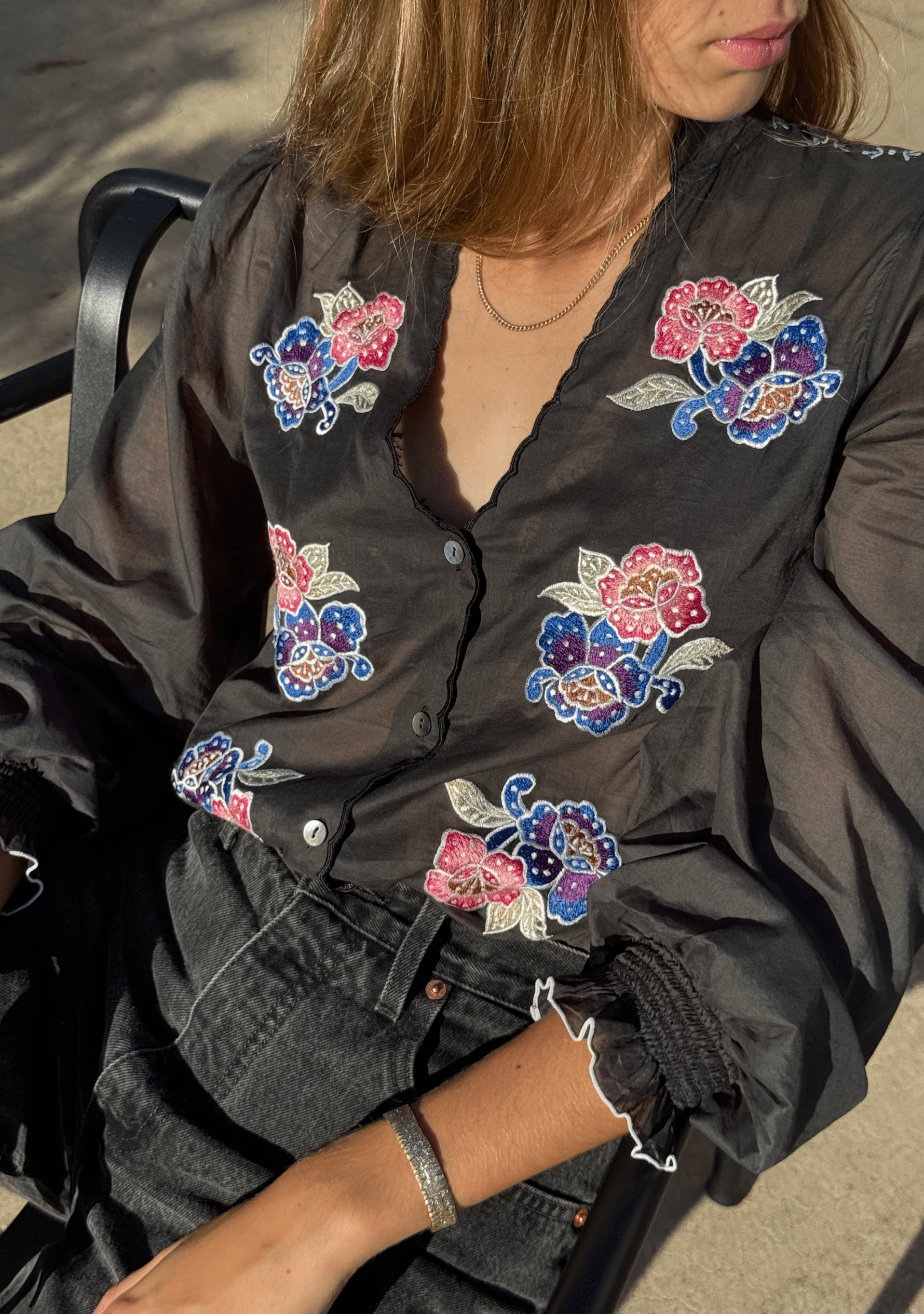 Image of a model wearing Tops. Productname: Auguste The Label Gisele Embroidered Blouse in Print colour by brand - Auguste The Label