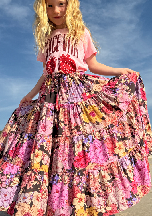 Image of a model wearing Skirts. Productname: LITTLE AUGUSTE Little Miss Maxi Skirt in Black colour by brand - LITTLE AUGUSTE