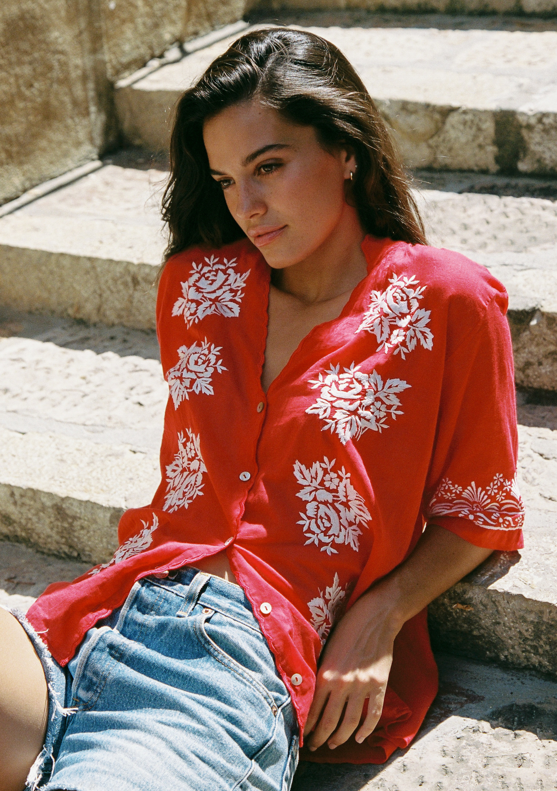Image of a model wearing Tops. Productname: Auguste The Label Rosalie Blouse | Pre Order - Buy Now in Red colour by brand - Auguste The Label