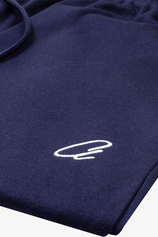 Image of a model wearing Shorts. Product name - Rise Navy Sleep Shorts in Navy colour by brand - Anthony Squires