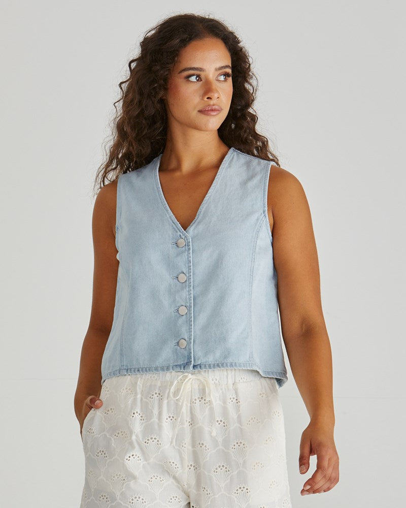 Image of a model wearing Tops. Product name - Sabine Denim Vest Bleach in Bleach colour by brand - Sass Clothing