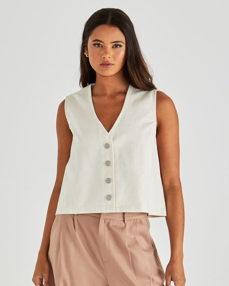 Image of a model wearing Tops. Product name - Sabine Denim Vest Parchment Wash in Parchment Wash colour by brand - Sass Clothing
