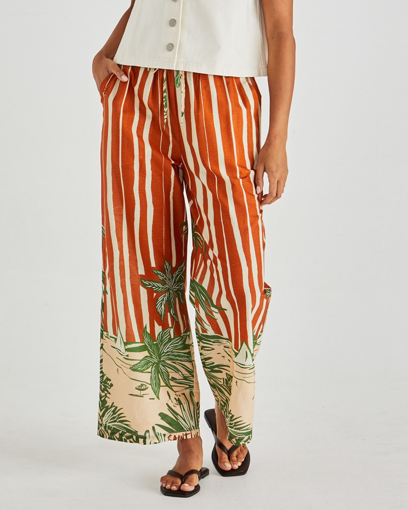 Image of a model wearing Pants. Product name - Mina Elasticated Pant Palm Stripe in Palm Stripe colour by brand - Sass Clothing