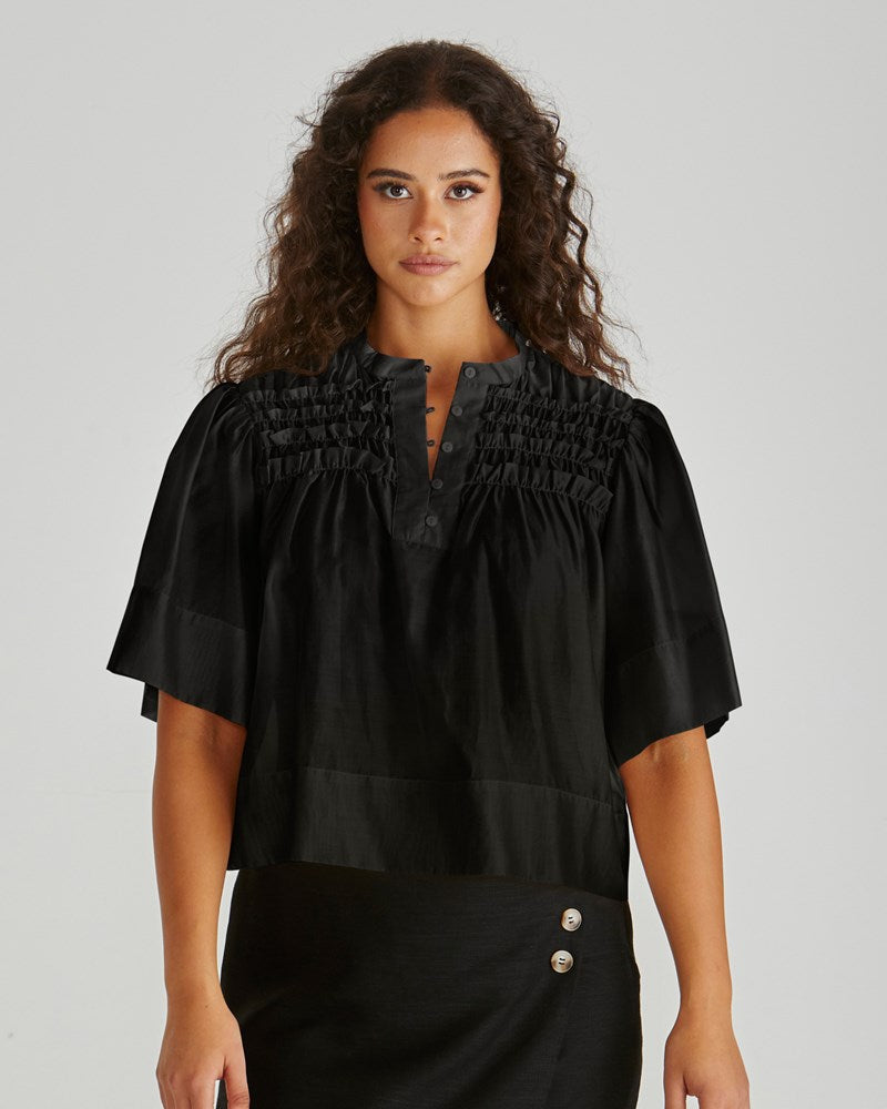 Image of Blouses. Product name - Fillip Ruffle Yoke Blouse Black in Black colour by brand - Sass Clothing