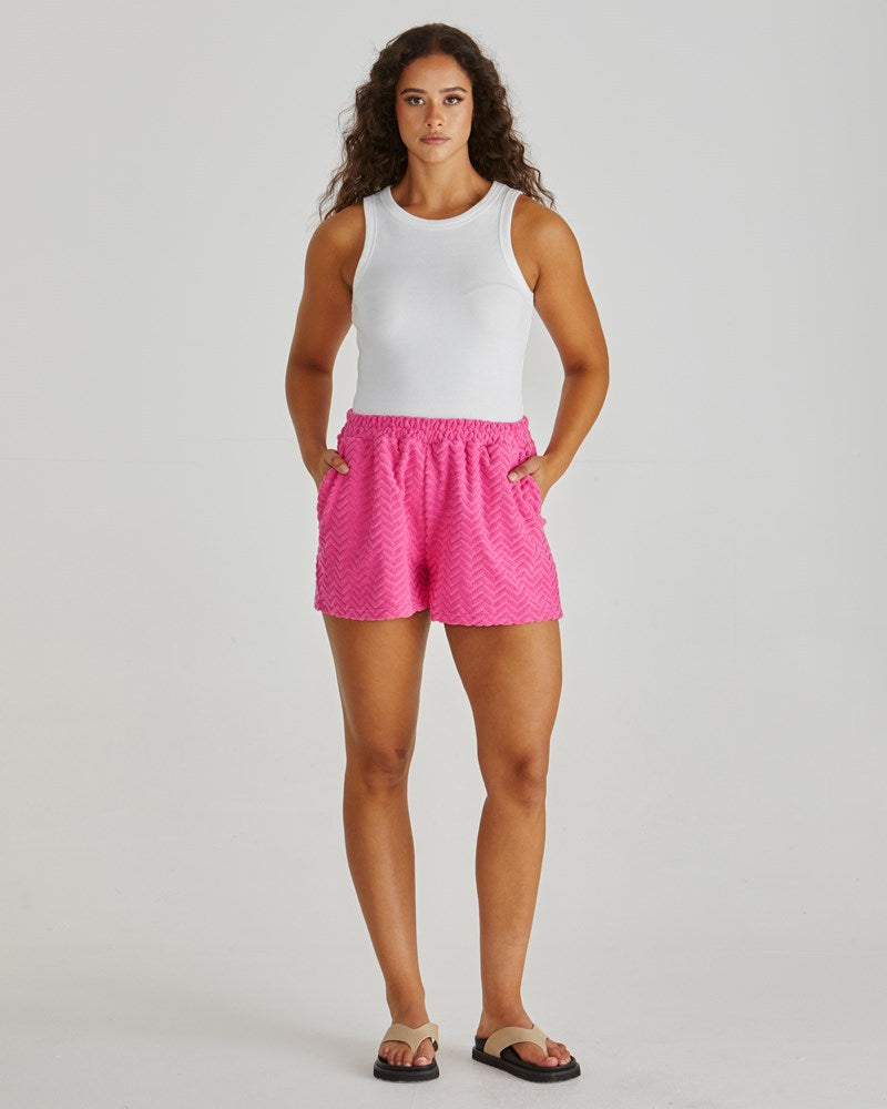 Image of a model wearing Shorts. Product name - Codi Short Pink Zig Zag in Pink Zig Zag colour by brand - Sass Clothing