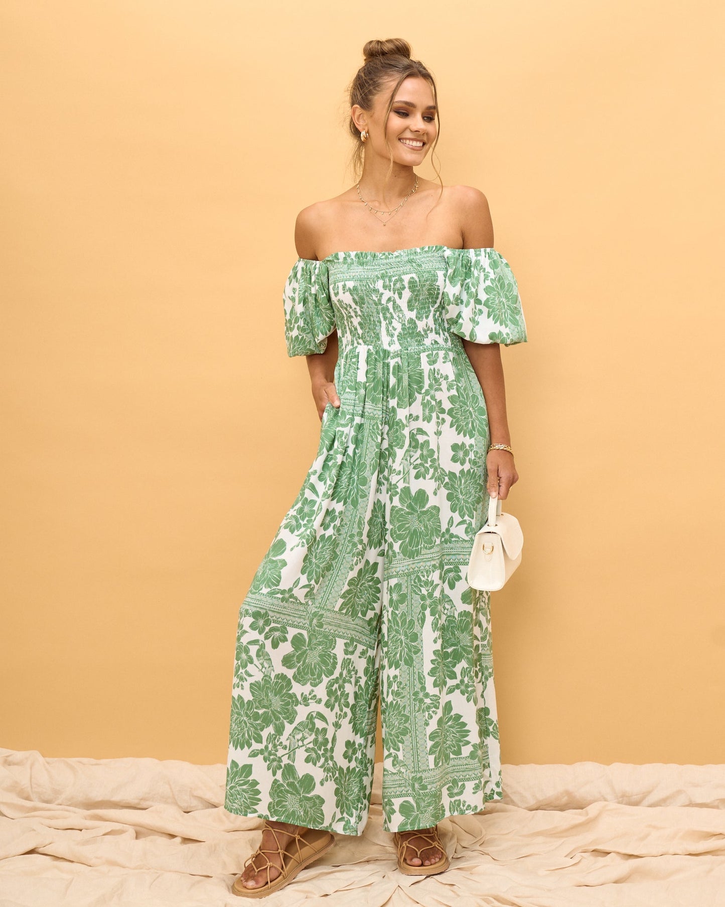 Image of Bodysuits. Product name - Viridiana Green Floral Puff Sleeve Jumpsuit in Floral colour by brand - Heychic