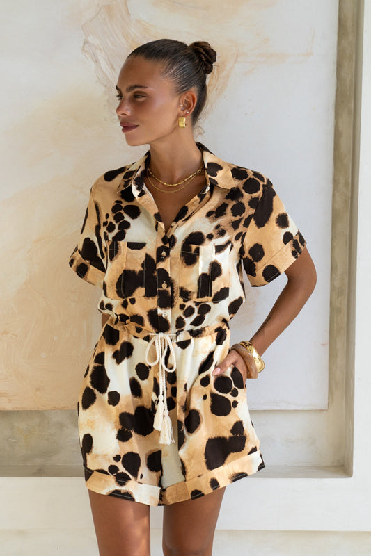 Image of a model wearing Outerwear. Productname: Heychic Zelina Brown Leopard Spot Playsuit in Brown colour by brand - Heychic