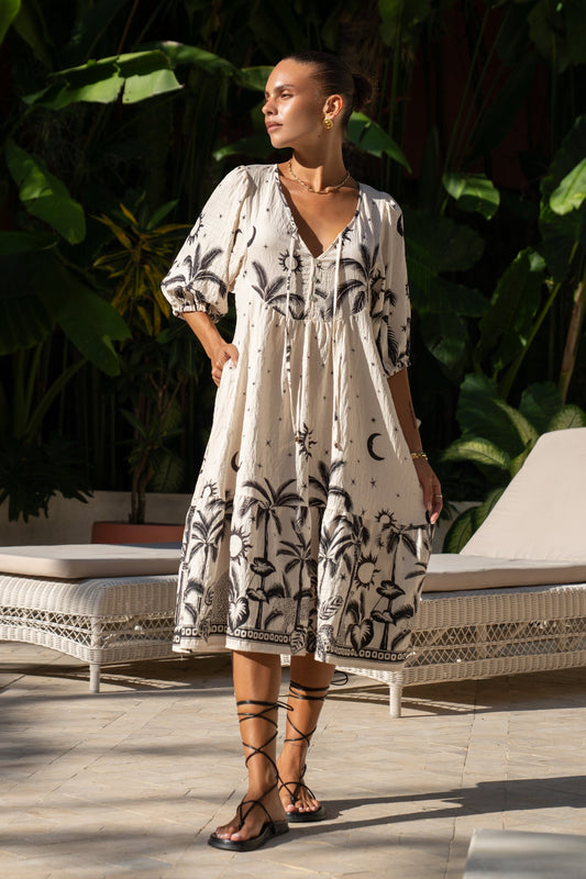 Image of Dresses. Productname: Heychic Savani Beige Black Tropical Volume Sleeve Midi Dress in Beige colour by brand - Heychic