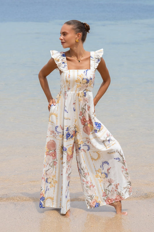 Image of a model wearing Outerwear. Productname: Heychic Melina Floral Ruffle Jumpsuit in Multicolour colour by brand - Heychic