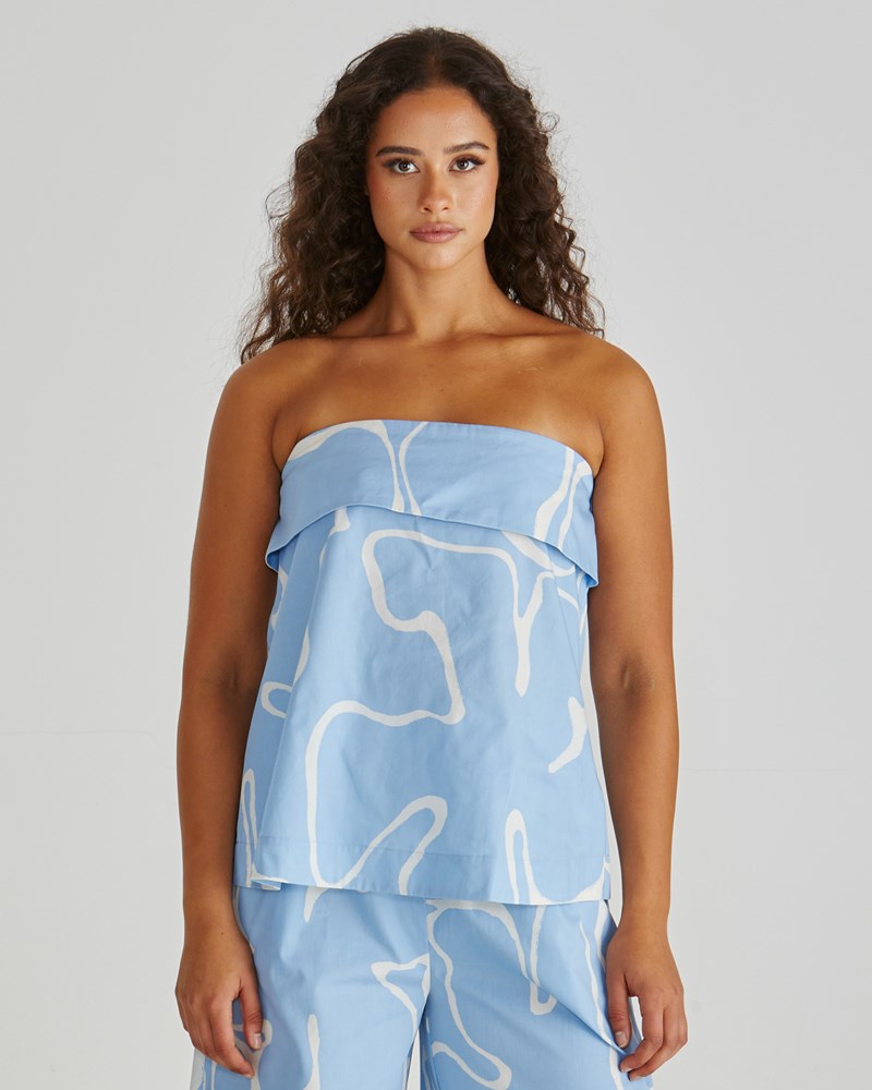 Image of a model wearing Tops. Product name - Tilda Strapless Top Abstract Daisy in Abstract Daisy colour by brand - Sass Clothing