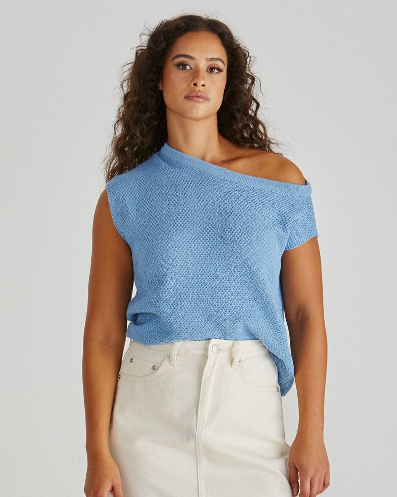 Image of a model wearing Tops. Product name - Jaci Knit Top Blue in Blue colour by brand - Sass Clothing