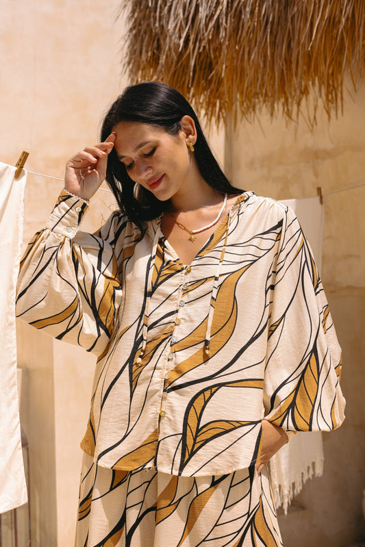 Image of a model wearing Tops. Productname: Heychic Rue Beige Abstract Balloon Sleeve Blouse in Beige colour by brand - Heychic
